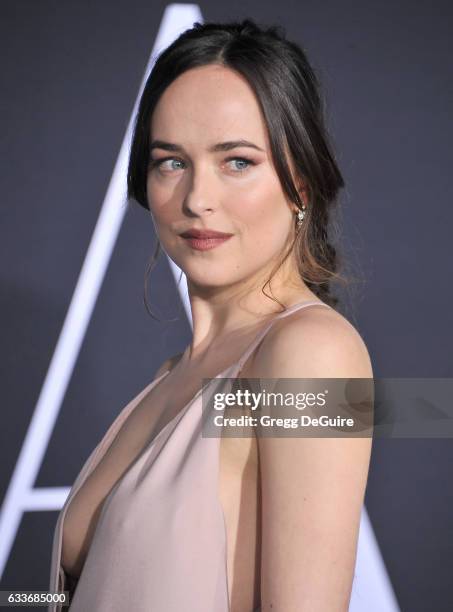 Actress Dakota Johnson arrives at the premiere of Universal Pictures' "Fifty Shades Darker" at The Theatre at Ace Hotel on February 2, 2017 in Los...