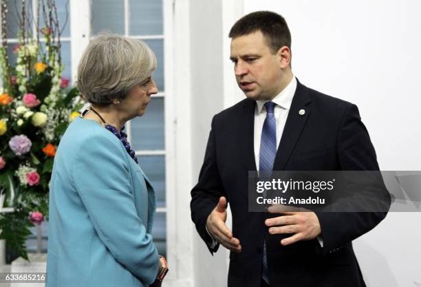 British Prime Minister Theresa May and Estonia's Prime Minister Juri Ratas chat during an informal European Union summit with the attendance of...