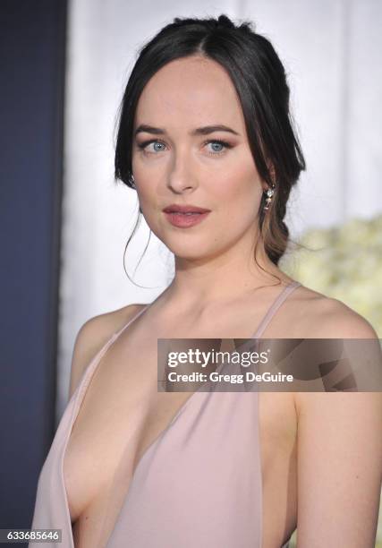 Actress Dakota Johnson arrives at the premiere of Universal Pictures' "Fifty Shades Darker" at The Theatre at Ace Hotel on February 2, 2017 in Los...