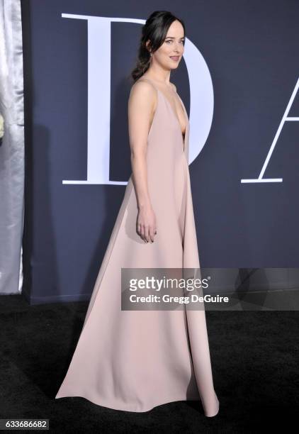 Actress Dakota Johnson arrives at the premiere of Universal Pictures' "Fifty Shades Darker" at The Theatre at Ace Hotel on February 2, 2017 in Los...