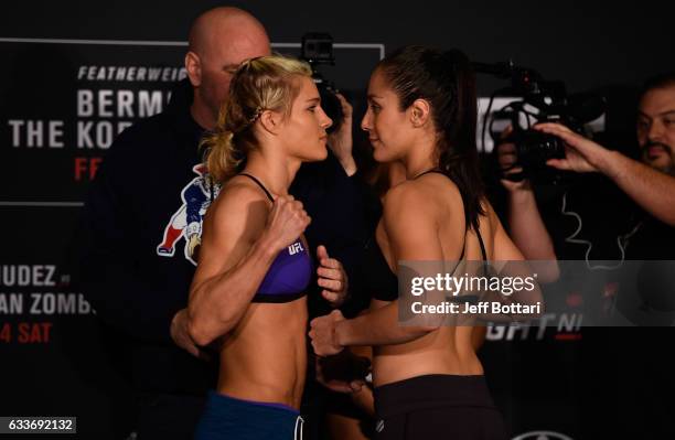 Opponents Felice Herrig and Alexa Grasso of Mexico face off during the UFC Fight Night weigh-in at the Sheraton North Houston at George Bush...