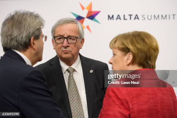 Prime Minister of Italy Paolo Gentiloni , President of the European Commission Jean-Claude Juncker and German Chancellor Angela Merkel talk ahead of...