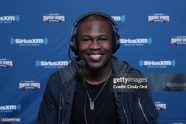 Denver Broncos running back Justin Forsett visits the SiriusXM set at Super Bowl LI Radio Row at the George R. Brown Convention Center on February 3,...