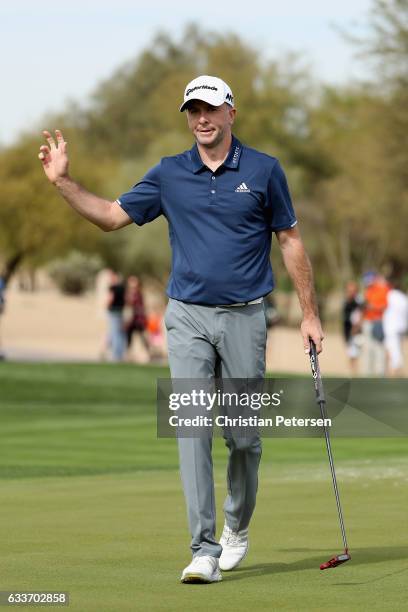 Martin Laird of Scotland reacts to his putt on the ninth green following the second round of the Waste Management Phoenix Open at TPC Scottsdale on...