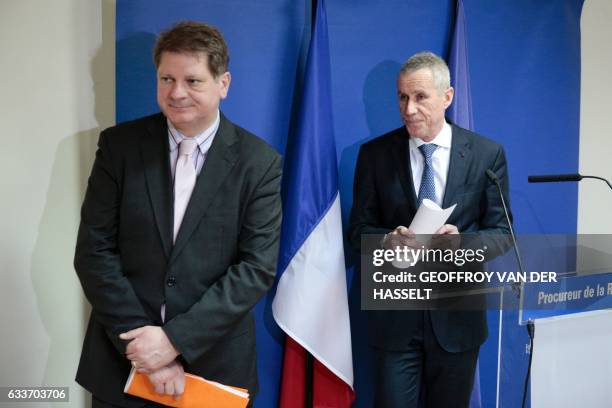 French public prosecutor of Paris Francois Molins and head of the French judicial police Christian Sainte leave after a press conference on February...