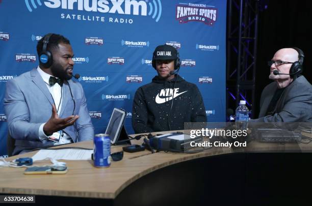 Carolina Panthers running back Fozzy Whittaker, left, and Chicago Bears wide receiver Cameron Meredith, center, visit the SiriusXM set at Super Bowl...