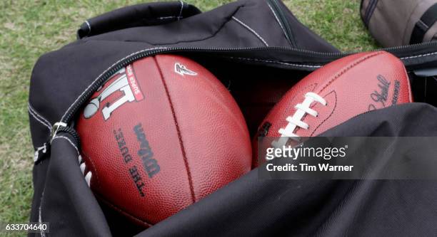 View of footballs with the Super Bowl LI and Atlanta Falcons logos at the Super Bowl LI practice on February 3, 2017 in Houston, Texas.