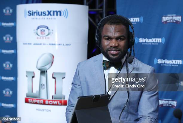 Carolina Panthers running back Fozzy Whittaker visits the SiriusXM set at Super Bowl LI Radio Row at the George R. Brown Convention Center on...