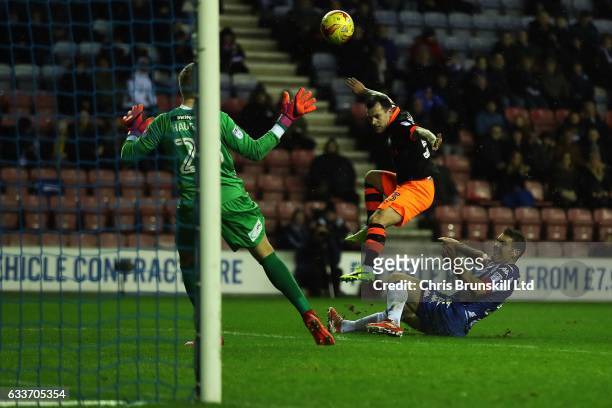 Ross Wallace of Sheffield Wednesday scores the opening goal during the Sky Bet Championship match between Wigan Athletic and Sheffield Wednesday at...