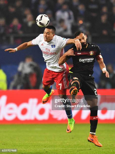 Bobby Wood of Hamburger SV is challenged by Omer Toprak of Bayer Leverkusen during the Bundesliga match between Hamburger SV and Bayer 04 Leverkusen...