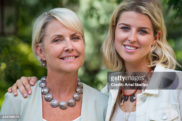caucasian mother and daughter smiling - look alike ストックフォトと画像