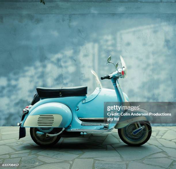 vintage scooter parked on sidewalk - motorbike sidecar stock pictures, royalty-free photos & images