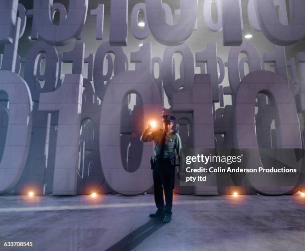 caucasian security officer guarding binary code - one man only photos stock illustrations