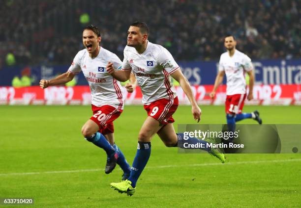 Kyriakos Papadopoulos of Hamburger SV celebrates scoring a goal with Albin Ekdal of Hamburger SV during the Bundesliga match between Hamburger SV and...