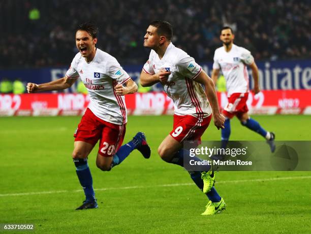 Kyriakos Papadopoulos of Hamburger SV celebrates scoring a goal with Albin Ekdal of Hamburger SV during the Bundesliga match between Hamburger SV and...