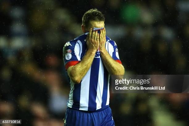 Jake Buxton of Wigan Athletic reacts during the Sky Bet Championship match between Wigan Athletic and Sheffield Wednesday at DW Stadium on February...