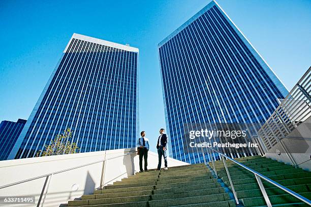 Talking Building Modern Architecture People Talking Photos and Premium High Res Pictures ...