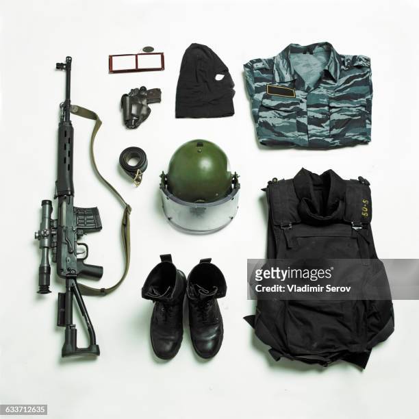organized military uniform and equipment - wapen apparatuur stockfoto's en -beelden