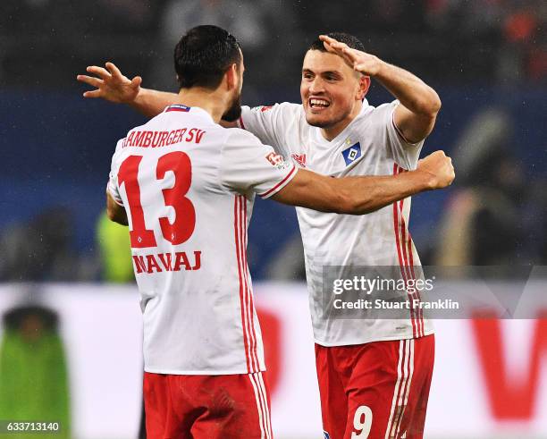 Kyriakos Papadopoulos and Mergim Mavraj of Hamburger SV celebrate after victory in the Bundesliga match between Hamburger SV and Bayer 04 Leverkusen...