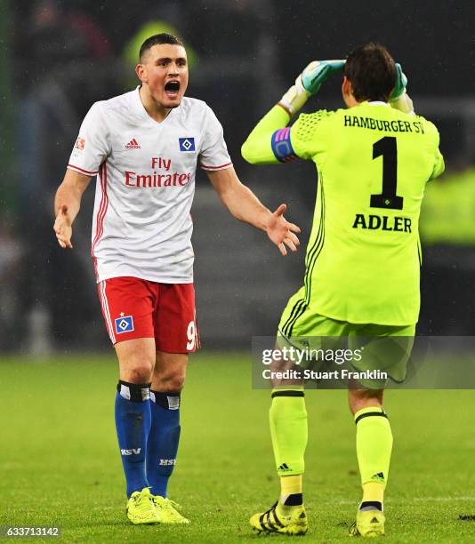 Kyriakos Papadopoulos and Rene Adler of Hamburger SV celebrate after victory in the Bundesliga match between Hamburger SV and Bayer 04 Leverkusen at...