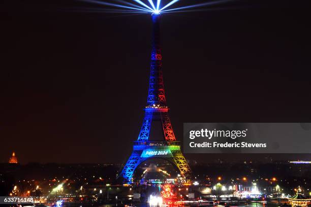 The Eiffel Tower is lit in the colours of the french bid logo during the launch of the international campaign for Paris' bid to host the 2024 Olympic...