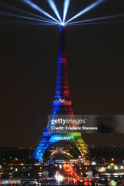The Eiffel Tower is lit in the colours of the french bid logo during the launch of the international campaign for Paris' bid to host the 2024 Olympic...