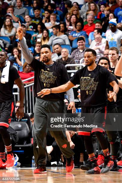 Jared Sullinger and Norman Powell of the Toronto Raptors react during the game against the Orlando Magic on February 3, 2017 at Amway Center in...