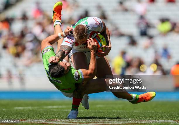 Aaron Gray of the Rabbitohs is upended by Nick Cotric of the Raiders during the 2017 Auckland Nines match between The Canberra Raiders and the South...