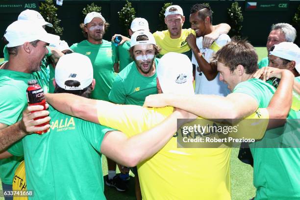 Jordan Thompson of Australia is surrounded by team-mates after winning the tie against Czech Republic during the first round World Group Davis Cup...