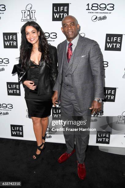 Former NFL player Deion Sanders and businesswoman Tracey Edmonds attend LIFEWTR: Art After Dark, including 1893, at Club Nomadic during Super Bowl LI...