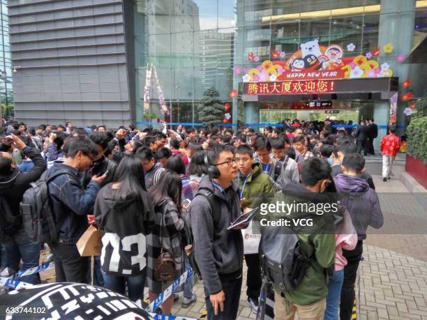 Tencent employees queue up for red envelopes at the company's headquarter on February 4, 2017 in Shenzhen, Guangdong Province of China. Tencent CEO...
