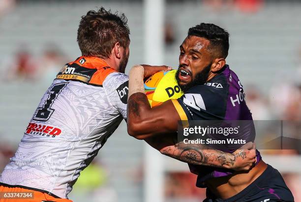 Josh Addo-Carr of the Storm looks to beat a tackle during the 2017 Auckland Nines match between the Wests Tigers and the Melbourne Storm at Eden Park...