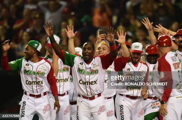 Players of Aguilas de Mexicali from Mexico celebrate victory over Aguilas del Zulia from Venezuela following their Caribbean Baseball Series at the...