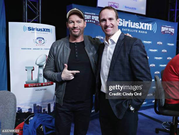 Harry Connick Jr., left, and New Orleans quarterback Drew Brees visit the SiriusXM set at Super Bowl LI Radio Row at the George R. Brown Convention...