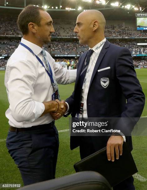 Melbourne City coach Michael Valkanis and Victory coach Kevin Muscat shale hands prior to the round 18 A-League match between Melbourne Victory and...