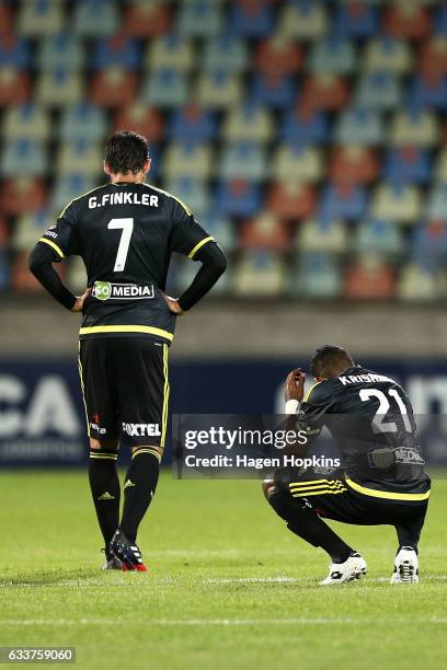 Gui Finkler and Roy Krishna of the Phoenix show their disappointment at the final whistle during the round 18 A-League match between the Wellington...