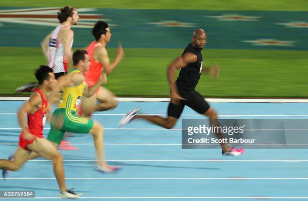 Asafa Powell of of Usain Bolt's All-Star team runs and wins the Men's 60 Metre race during Nitro Athletics at Lakeside Stadium on February 4, 2017 in...