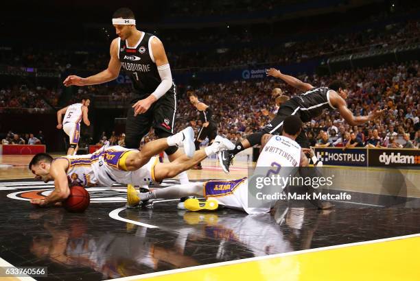 Kevin Lisch of the Kings dives on the ball during the round 18 NBL match between the Sydney Kings and Melbourne United at Qudos Bank Arena on...