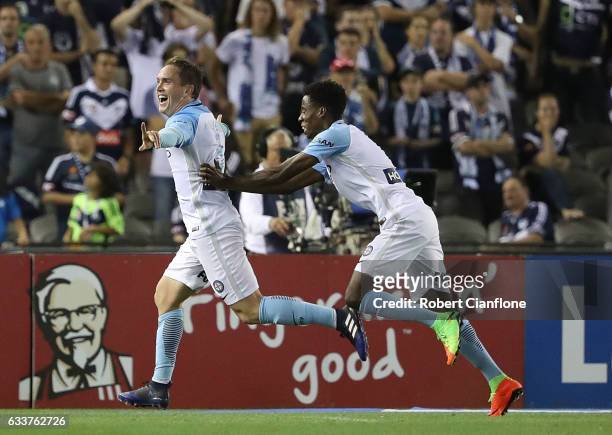 Neil Kilkenny of Melbourne City celebrates after scoring a goal during the round 18 A-League match between Melbourne Victory and Melbourne City FC at...