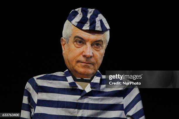 Representations of the protagonists involved in the current upheaval in Romanian graft law revision are seen in prison uniforms. Several thousand are...