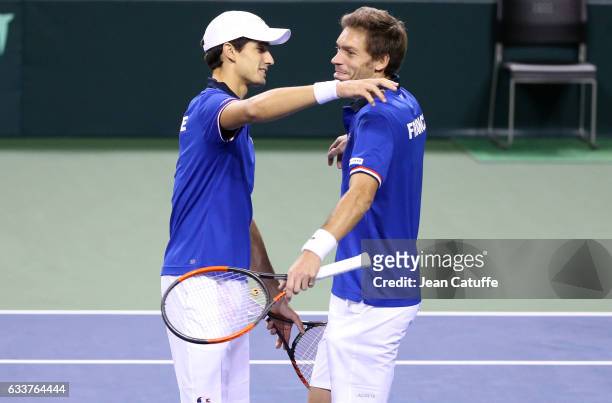 Pierre-Hughes Herbert and Nicolas Mahut of France celebrate winning the doubles and the tie 3-0 on day 2 of the Davis Cup World Group first round tie...