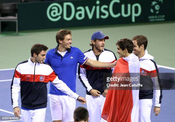 Gilles Simon, Nicolas Mahut, Lucas Pouille, Pierre-Hughes Herbert, Richard Gasquet of France celebrate winning the doubles match and the tie 3-0 on...