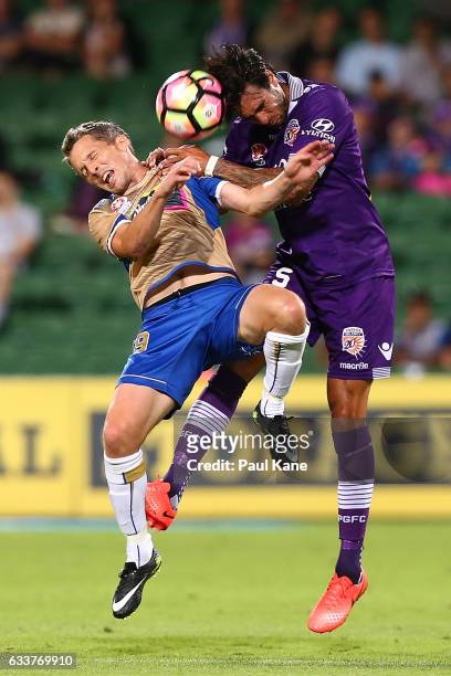 Morten Nordstrand of the Jets and Rhys Williams of the Glory contest for the ball during the round 18 A-League match between the Perth Glory and the...