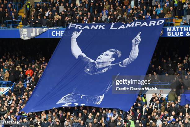 Chelsea fans unfurl a banner in honour of former player Frank Lampard, following his announcement to retire from the game before the Premier League...