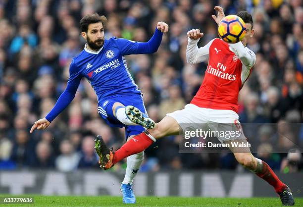 Cesc Fabregas of Chelsea scores his team's third goal during the Premier League match between Chelsea and Arsenal at Stamford Bridge on February 4,...