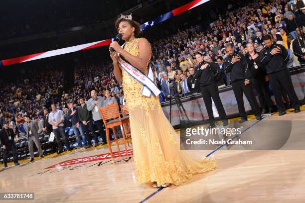 Miss Black USA Talented Teen Pageant contestant performs the National Anthem before the Charlotte Hornets game against the Golden State Warriors on...