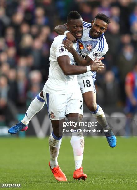 Lamine Kone of Sunderland celebrates scoring the opening goal with his team mate Jermain Defoe during the Premier League match between Crystal Palace...