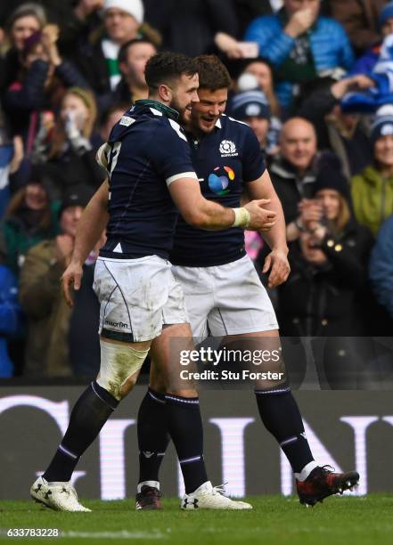 Scotland try scorer Alex Dunbar is congratulated by Ross Ford after his try during the RBS Six Nations match between Scotland and Ireland at...