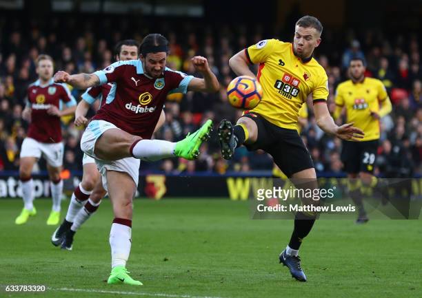 George Boyd of Burnley and Tom Cleverley of Watford compete for the ball during the Premier League match between Watford and Burnley at Vicarage Road...