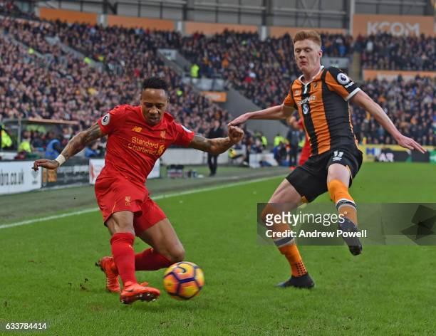 Nathaniel Clyne of Liverpool with Sam Clucas of Hull City during the Premier League match between Hull City and Liverpool at KCOM Stadium on February...